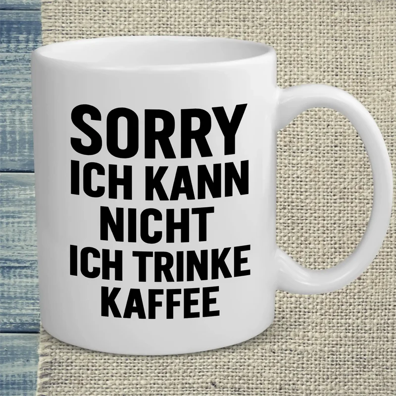 Sorry. Ich kann nicht. Ich trinke Kaffee. - Tasse