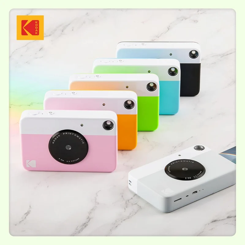 KODAK Printomatic Sofortbildkamera (Grün) Geschenkpaket + Zinkpapier (20 Blatt) + Etui + 7 Aufkleber