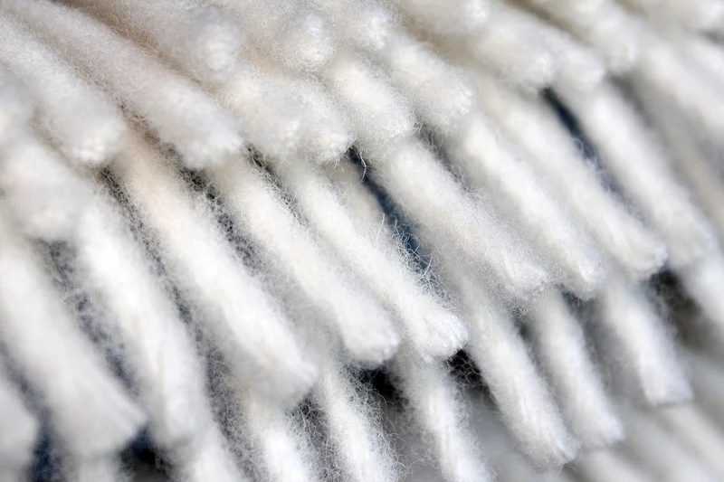 Die Woll-Friesen Flauschige Wolldecke/Wohndecke/Kuscheldecke/Plaid „Blavand“, lila gelb rosa gestrei