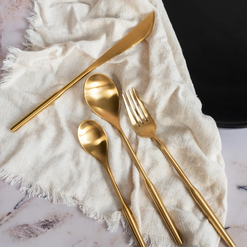 Neu: Kikis Besteckset 8 tlg - GOLD